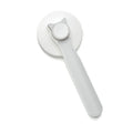 White door handle with a circular design on a white background